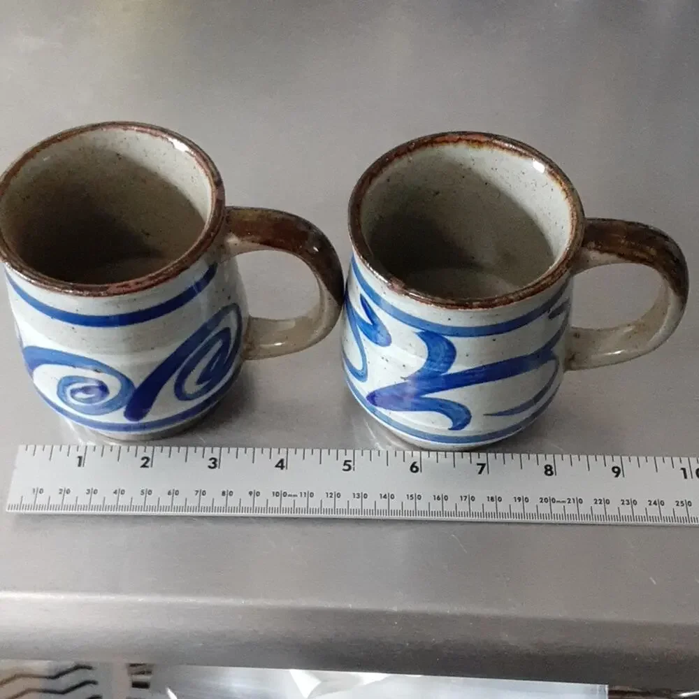 Handmade set of glazed pottery mugs
